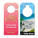 Two door hangers: one pink with gold logo and text for a salon, the other featuring a beach scene with a privacy message.