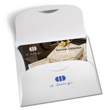 A white presentation folder with a logo, featuring a display of a summer collection inside.