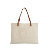 A canvas bag in beige with brown leather straps, featuring a plain design and a logo on the side.