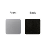 A square metal coaster featuring a brushed silver front and a black, textured back. It has a branding logo.