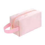 A pink flannel cosmetic bag with a zip closure and a strap on one side, featuring a branding logo.