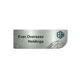 A custom metal name badge in silver with geometric designs and a logo on the side.