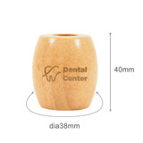 A bamboo toothbrush stand with a natural finish, featuring a logo, measuring 40mm tall and 38mm in diameter.