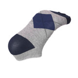 Ankle cut jacquard socks featuring a grey base with navy blue diamond patterns and solid navy toe and heel sections.