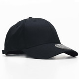A black cap with a curved brim and an adjustable strap, featuring a round logo on the front.
