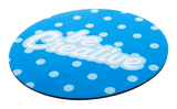 A round blue neoprene mouse pad with white polka dots and a logo featuring the text "be Creative."