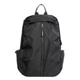 A black backpack with multiple compartments and pockets, featuring a top handle and a logo.