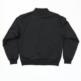 A black bomber jacket with a simple design, featuring a collar and long sleeves. It has a logo on the back.