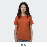 An orange women's T-shirt displayed on a model, featuring a simple design and a logo.