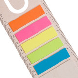 A rectangular ruler features five colorful sticky bookmarks in orange, pink, yellow, green, and blue.
