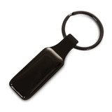 A rectangular key ring in black with a smooth finish and a metal ring attachment.