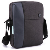 A Swissdigital Arosa shoulder bag in dark grey with a contrasting panel, featuring a logo and adjustable strap.