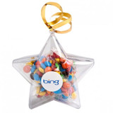 Acrylic star container filled with colourful M&Ms, tied with a gold ribbon, featuring a logo.