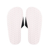 Black EVA slides with a textured white sole, featuring a simple design and no visible branding.