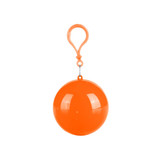 An orange ball with a clip attachment, designed for a novelty rain poncho.