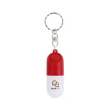 A red and white pill capsule keychain featuring a silver keyring and a logo on the surface.