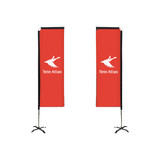 Two tall rectangular banners are displayed on black bases with a red background and a logo.