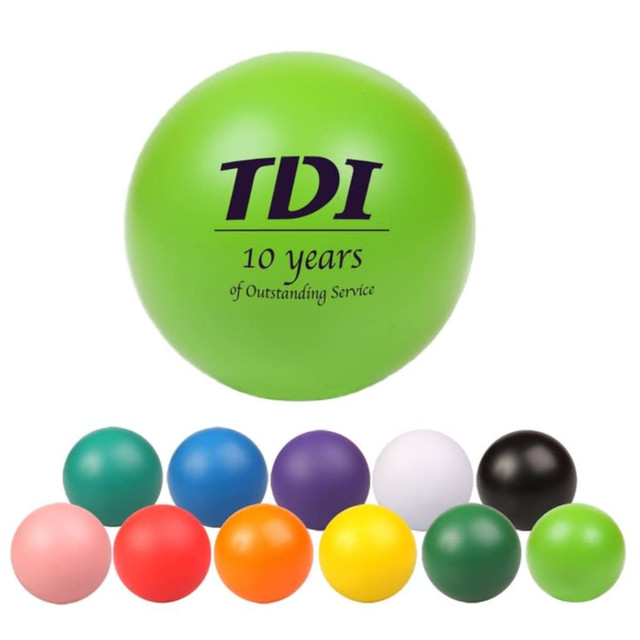A collection of stress balls in various colours, including green, pink, purple, yellow, white, and black, with one featuring a logo.
