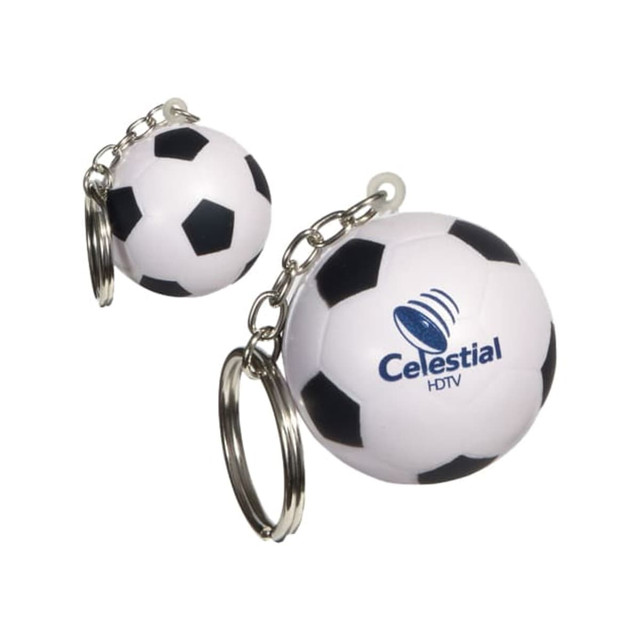 A keyring with two football-shaped stress relievers, featuring a white and black design, and a logo.