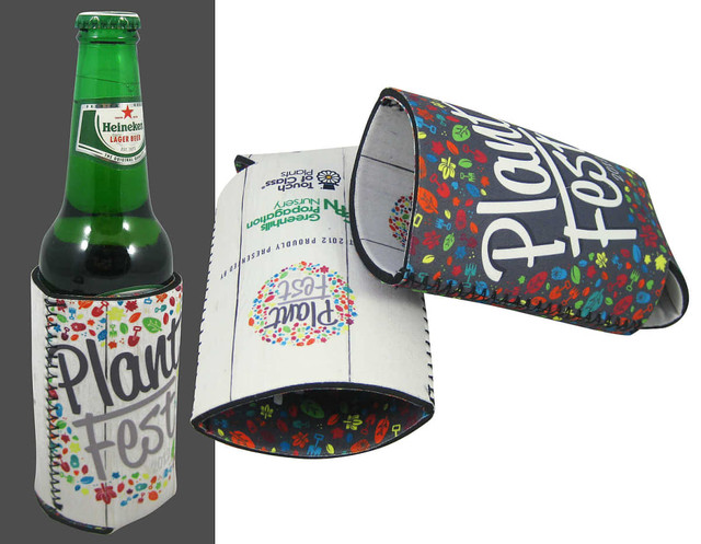 A drink bottle surrounded by a colourful reversible bottle cooler featuring a floral design and a logo.