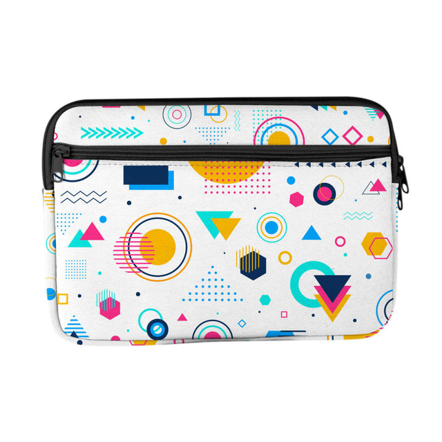 A laptop sleeve featuring a colourful geometric pattern with various shapes and a zipper closure.