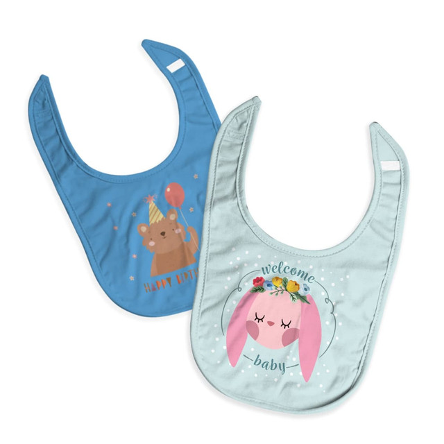 Two baby bibs: one in blue with a bear design, the other in light green featuring a bunny design and floral elements.