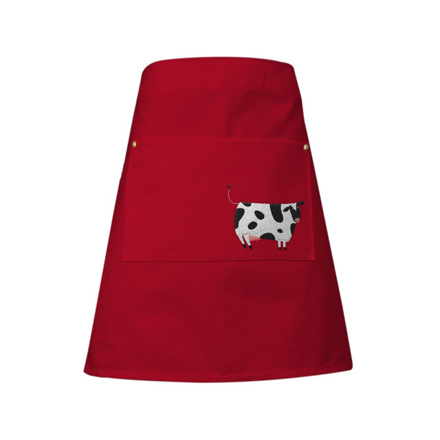 A red waist apron with removable straps and a large pocket featuring a cow design. It has a logo.