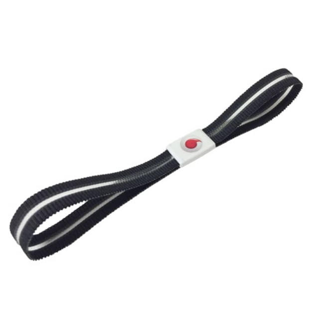 An elastic notebook closure in black with a white stripe and a small logo in the centre.