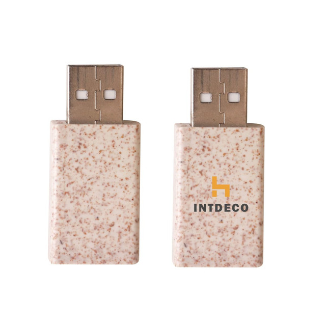 A wheat straw USB data blocker in a speckled light beige colour, featuring a logo on the side.