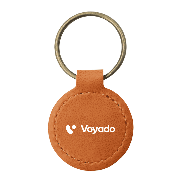 A round keyring made from recycled leather in a tan colour with a metal ring and a branding logo.
