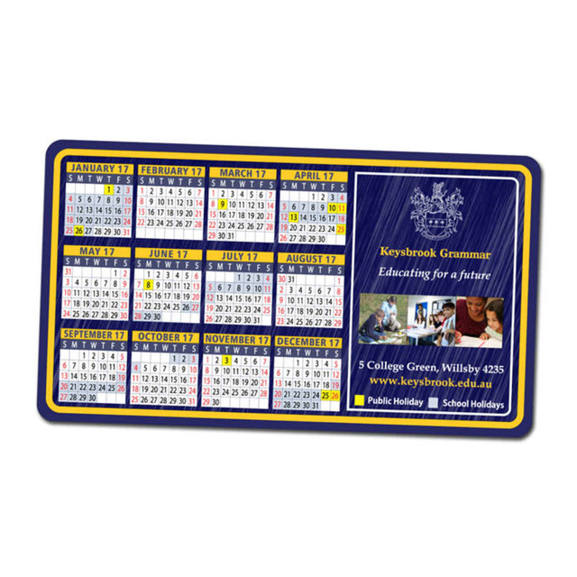 Magnetic calendar featuring a monthly layout for 2017, predominantly blue and white, with a school logo.