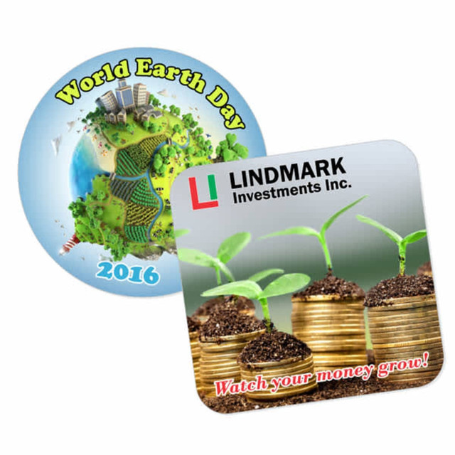 Two coasters: one circular with a green Earth design and a square one featuring coins and seedlings, both with logos.