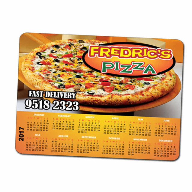 A magnetic calendar featuring a pizza, with vibrant colours and a logo at the top. The calendar layout is clearly visible.