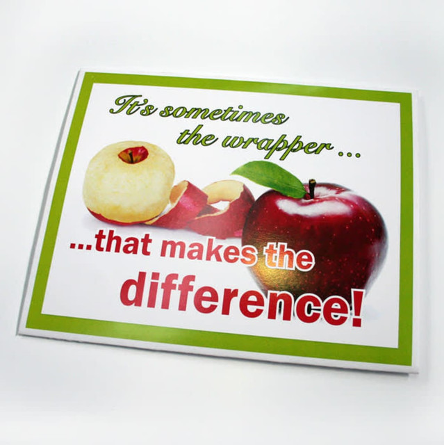 A presentation folder featuring a red and green apple graphic with the text about wrappers, set against a white background.