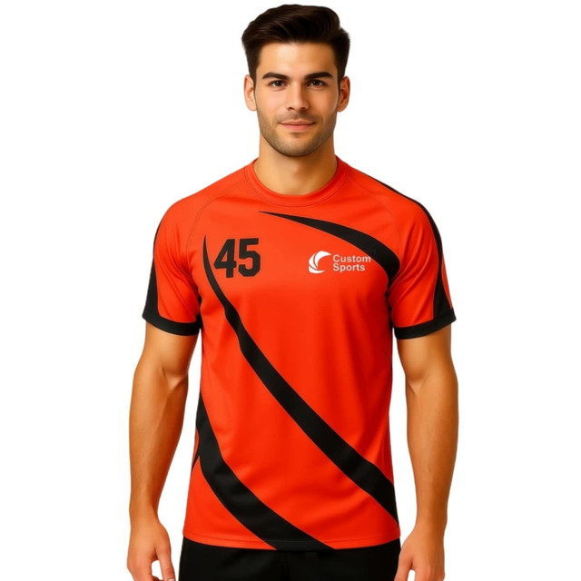 An orange and black crew neck sport tee with a logo and number on the front, featuring a raglan style design.