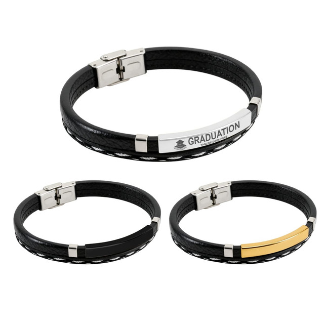 A set of three personalised leather bracelets in black, featuring metal accents. One has a graduation-themed plate.