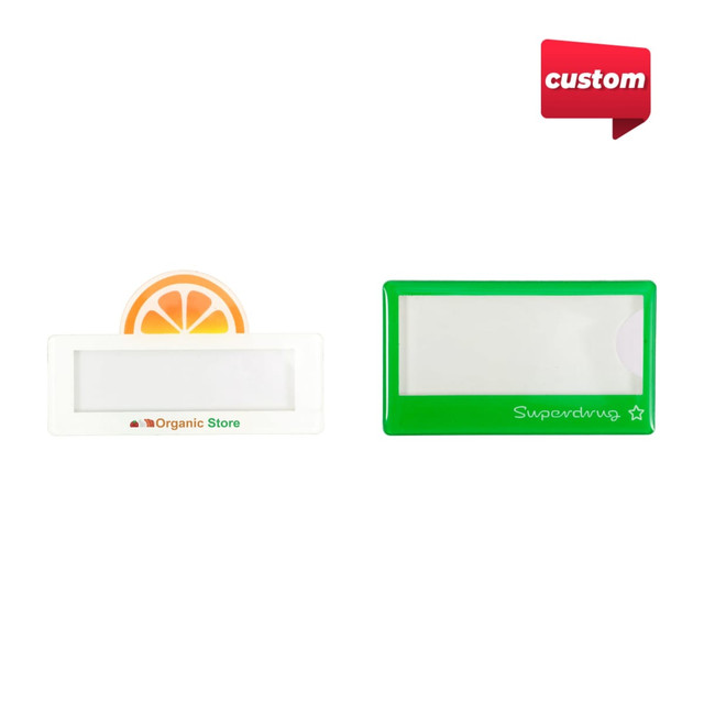 Custom reusable acrylic name badges in white and green, featuring a logo on one badge.
