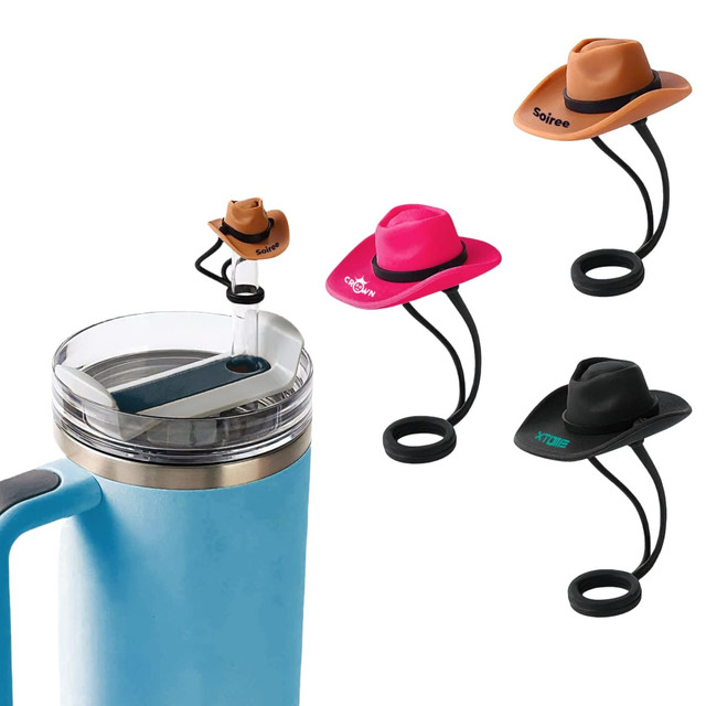A drink bottle with a grey lid alongside four silicone straw covers in brown, pink, and black hat designs.