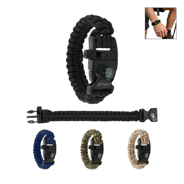 A paracord survival bracelet in black, featuring a whistle, compass, and a variety of colours including navy and khaki.