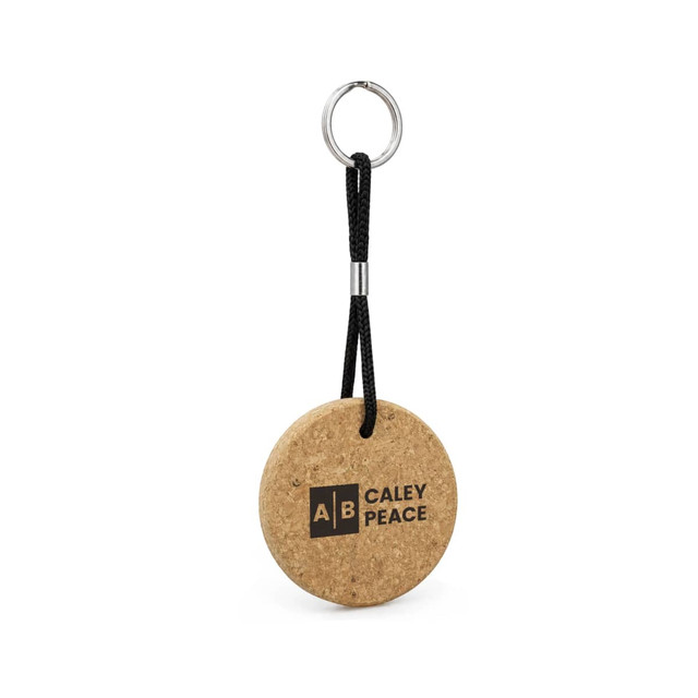 A round cork keyring with a black cord attachment and a silver metal keyring.