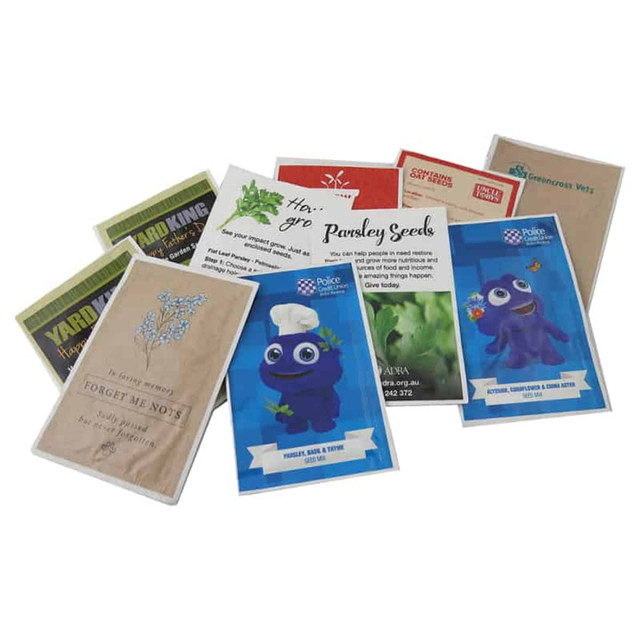 A collection of foil seed sachets in various designs, featuring colourful illustrations and branding, including greens and flowers.