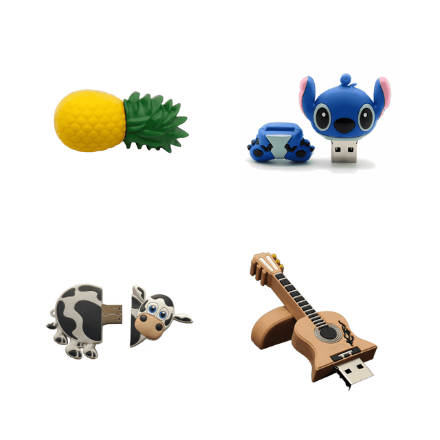 A collection of four custom 3D USB flash drives, including a pineapple, cow, guitar, and a blue character with ears.