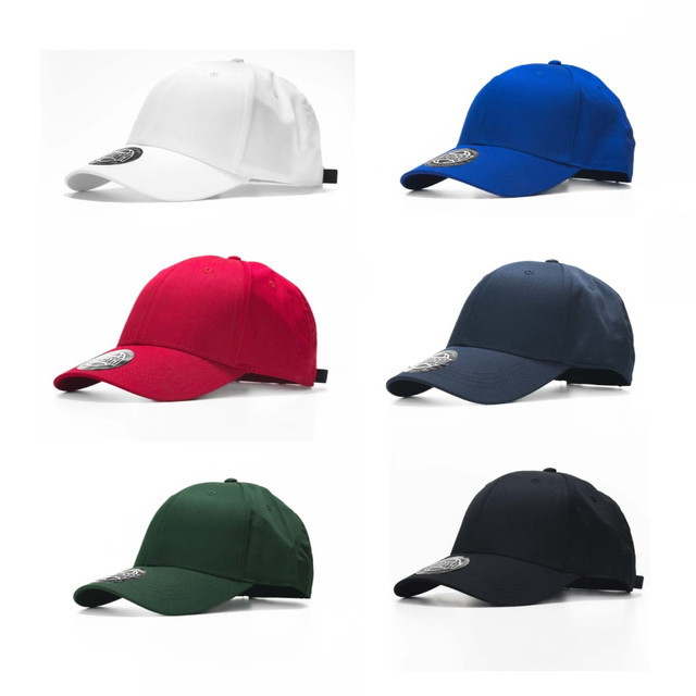 A collection of six caps in white, blue, red, navy, green, and black, each featuring a logo on the front.