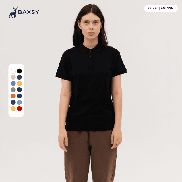 A woman wearing a black polo shirt stands against a neutral background. The shirt features a collar and short sleeves.