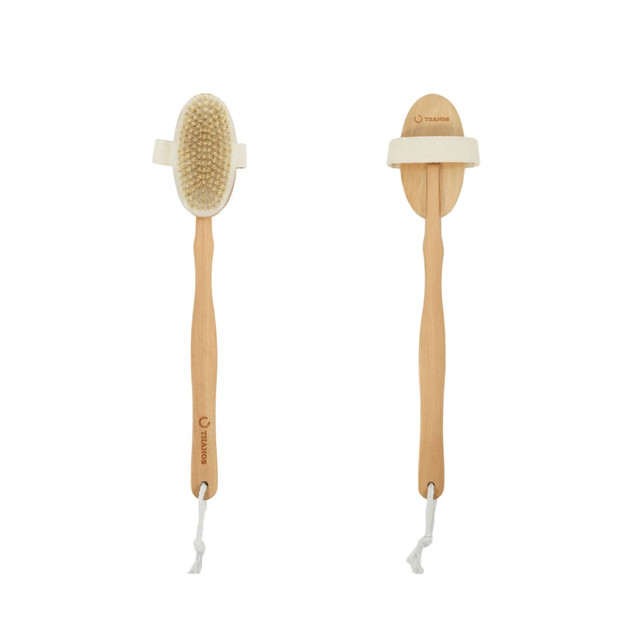 A detachable shower brush with a long wooden handle and a light-coloured bristle head, featuring a branding logo.