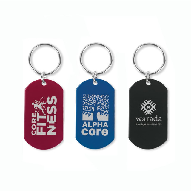 A set of three key rings in burgundy, blue, and black, each featuring a different logo or design.
