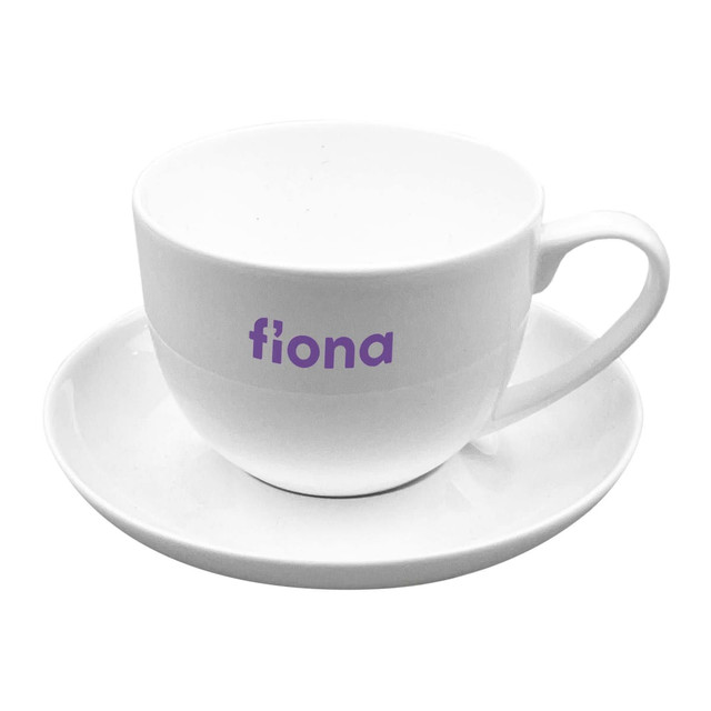 A white tea cup with a matching saucer, featuring a logo in purple on the cup.