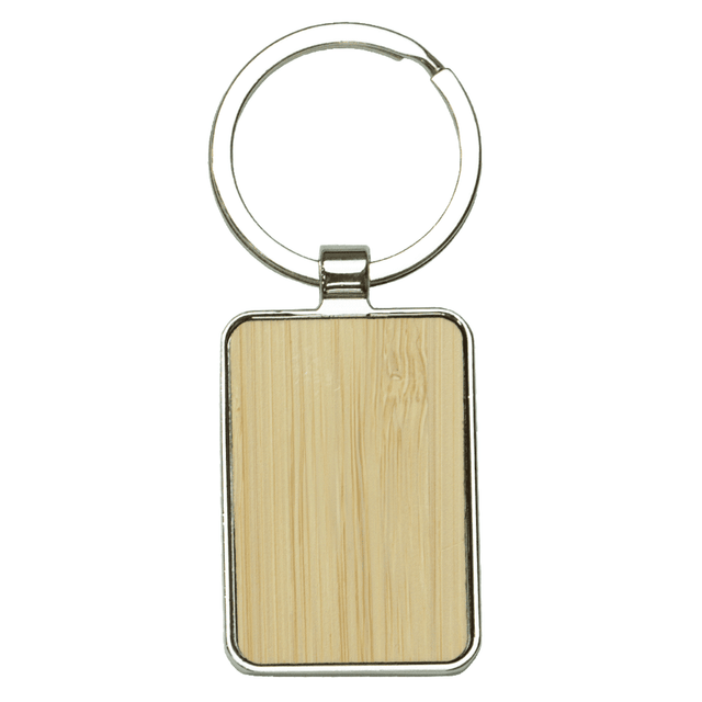 A rectangular keyring made of recycled zinc alloy with a bamboo insert, featuring a shiny silver finish.