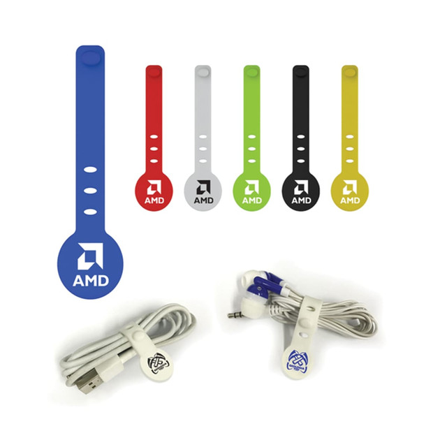 A collection of cable organisers in blue, red, grey, green, black, and a white USB cable with clips. Each organiser features a logo.