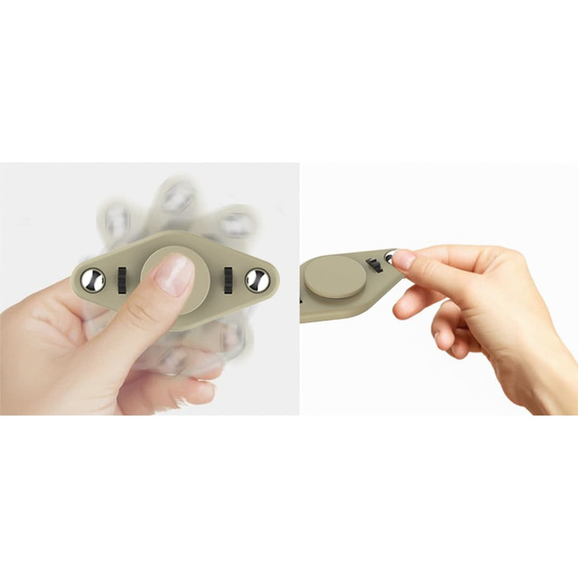 A hand holds a tan stress reliever fidget toy featuring three spinning discs and a finger grip.
